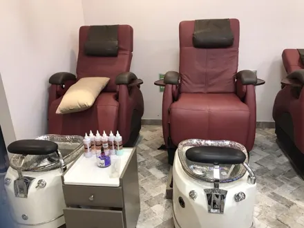 Our burgundy massage pedicure chairs, ready for the day