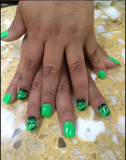 Green dip nails with delicate floral art